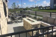 Custom linear fire pit. Stone: Cottonwood 2"-8" MSRV. Buff landscape coping.