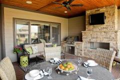 Napoleon Mirage Built-In Grill and Napoleon Outdoor Fireplace with Mahogany Prairie Stone.