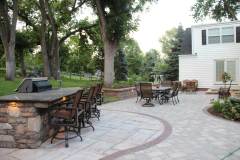Unilock Rivenstone Canyon and Brussels Block Limestone with Copthorne Inlay