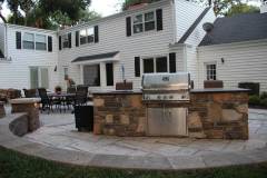 Unilock Rivenstone Canyon and Brussels Block Limestone with Copthorne Inlay